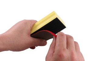 Introducción de material de papel de lija