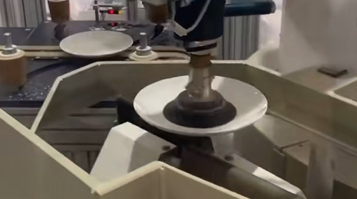 Diamond abrasive sanding belts for smoothing bottom of ceramicware