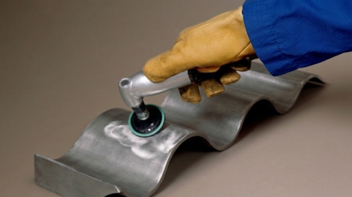 Diamond cloth disc polishing corrugated metal